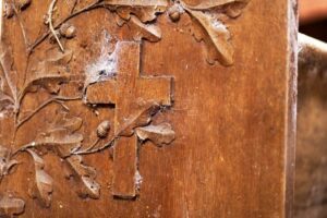 original pew designs with acorns, ivy, and olives. Courtesy of the Belmont Chapel Foundation.