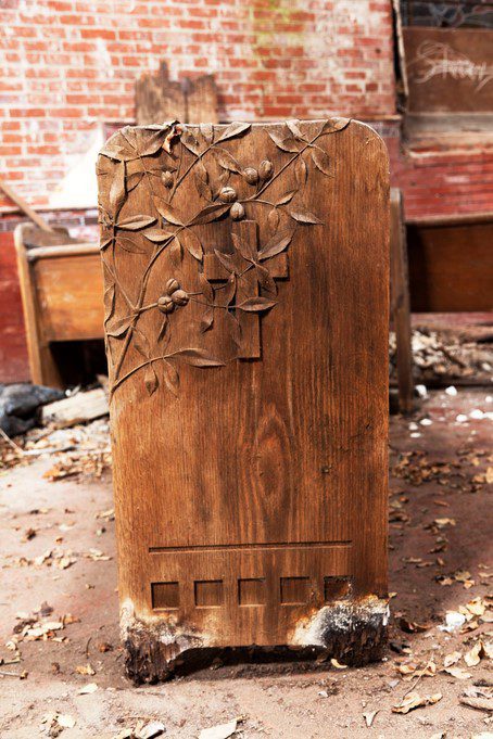 original pew designs with acorns, ivy, and olives. Courtesy of the Belmont Chapel Foundation.