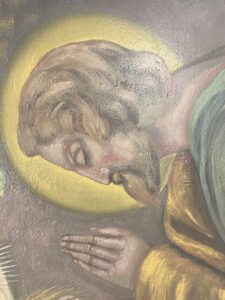Close-up details of overpaint removed and inpainting of Joseph